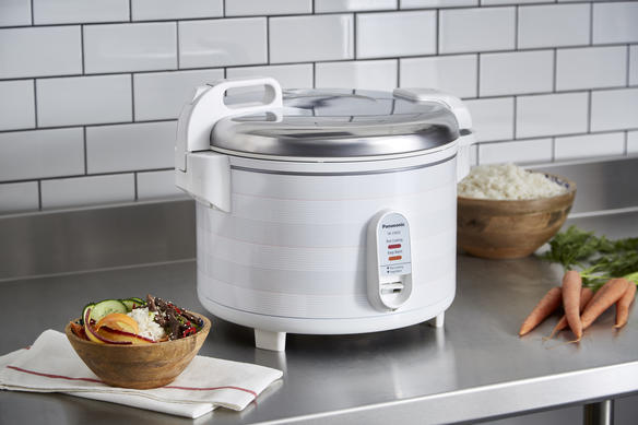rice cooker on countertop side view with food